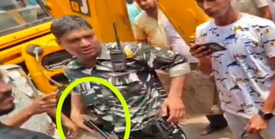Deoghar News : अतिक्रमण हटाने के दौरान आरक्षी ने निकाली पिस्टल, एसपी ने दिया जांच का आदेश