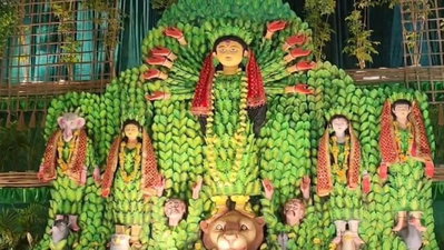 Dhanbad News : धनसार में एक लाख पौधों की हरियाली में विराजमान मां दुर्गा