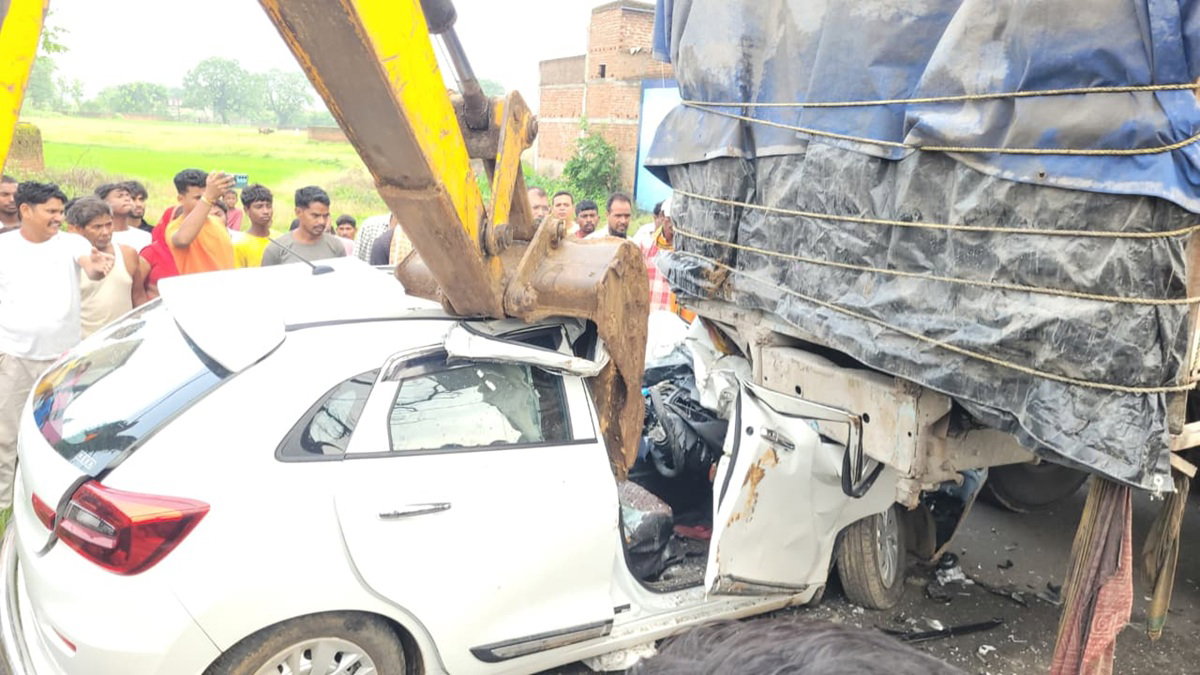 Car rams into stationary truck
